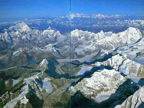 
Leo Dickenson and Chris Dewhirst's balloon taking off from Gokyo October 21, 1991. Gauri Shankar and Menlungtse on the left; Shishapangma top middle-right; Cho Oyu on the right. - Ballooning Over Everest book 
